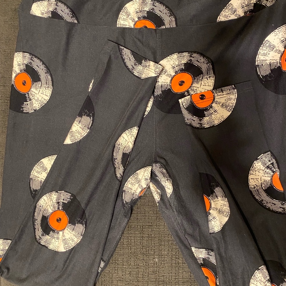 LuLaRoe Black and Orange Leggings with Record Print